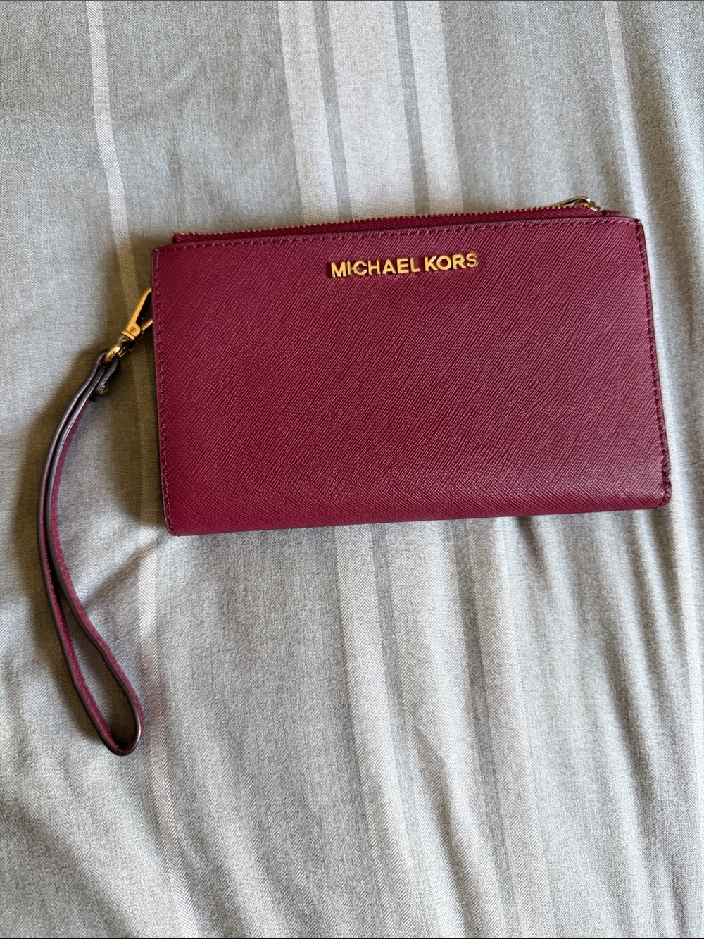 Michael Kors Wine Saffiano Leather Wristlet with Gold Logo